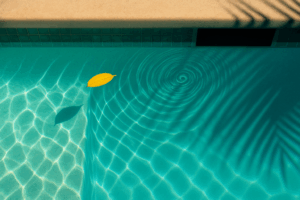 pool skimmer repair Orlando shown by a top-down view of a leaf spiraling into a waterline vortex near the skimmer slot with palm-shadow caustics.
