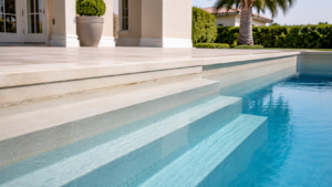 Pool Pump Repair Orlando shown by shallow pool steps with a faint old waterline mark visible above the current water level.